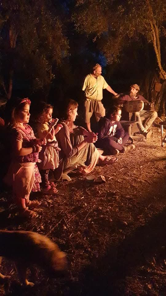 Music and children around the campfire